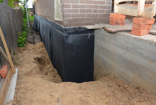 SJ Waterproofing Pros technician performing targeted Waterproofing assessment in Falmouth, VA
